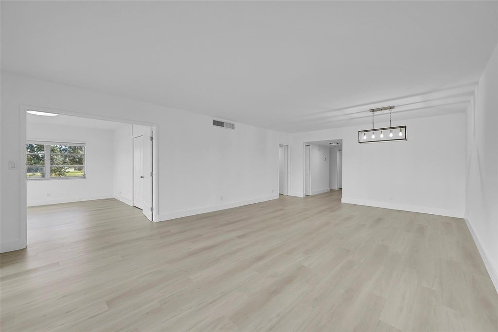 Photo of 2801 N Palm Aire Dr #201, Pompano Beach, FL 33069 (MLS # F10532787)