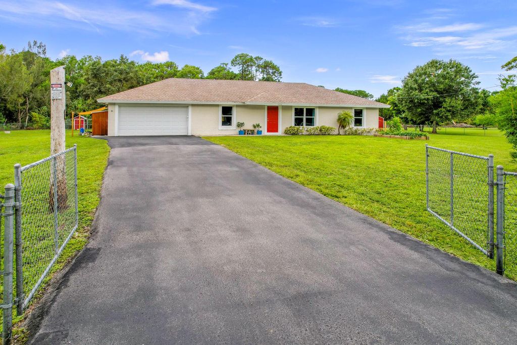 Photo of 17122 43rd Road N, The Acreage, FL 33470 (MLS # R11010313)