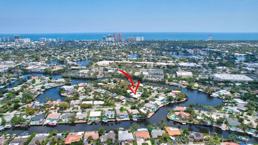 Welcome to this spacious and versatile home in the heart of Wilton Manors Coral Point neighborhood! This expansive two-story residence offers nearly 3,500 square feet of flexible living space, perfect for multi-generational living, a large household, or anyone seeking room to grow. Nestled on a quiet street, this property is brimming with character, functionality, and untapped potential. The original structure features a well-laid-out first floor that includes two generously sized bedrooms and two full bathrooms, including a primary bedroom suite—ideal for those who prefer first-floor living. The massive family room serves as the heart of the home, offering plenty of space to relax or entertain, with sliding glass doors that lead out to the private backyard. You'll also find a den or home office off the kitchen, a convenient half bath, a spacious laundry room, and a large workshop/storage room - all rare and valuable features that provide outstanding versatility. Head up the mahogany staircase to the thoughtfully designed second-floor addition, completed in 1989. Here, you'll discover two oversized bedrooms, each with walk-in closets, and a shared full bathroom featuring dual sinks. With so much space upstairs, there's ample opportunity to create a second primary suite, media room, or home gymthe possibilities are endless. Additional highlights include hurricane impact windows throughout for peace of mind and energy efficiency, metal shutters for both the front door and sliding glass door, ample closet and storage space throughout the home, private yard with plenty of room for a pool or garden expansion, and a well-established neighborhood with minimal through-traffic. Whether you're looking to modernize, personalize, or simply move right in, this home offers a solid foundation with tremendous potential in one of Wilton Manors' most desirable locations. Don't miss your chance to make this extra-large, rarely available home your own!