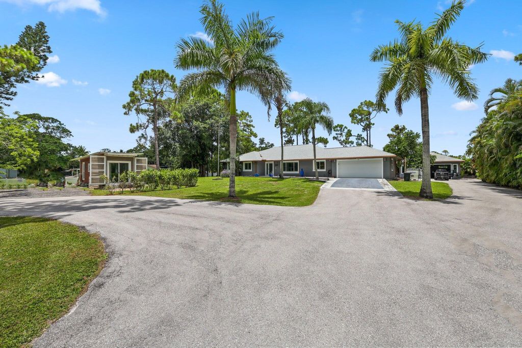 Photo of 11159 54th Street N, The Acreage, FL 33411 (MLS # R11002343)