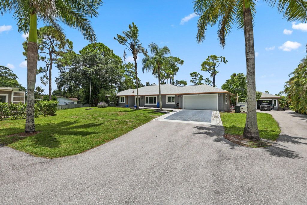 Photo of 11159 54th Street N, The Acreage, FL 33411 (MLS # R11002343)