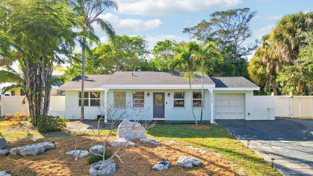 Photo of 19965 Jasmine Drive, Jupiter, FL 33469 (MLS # R11156580)