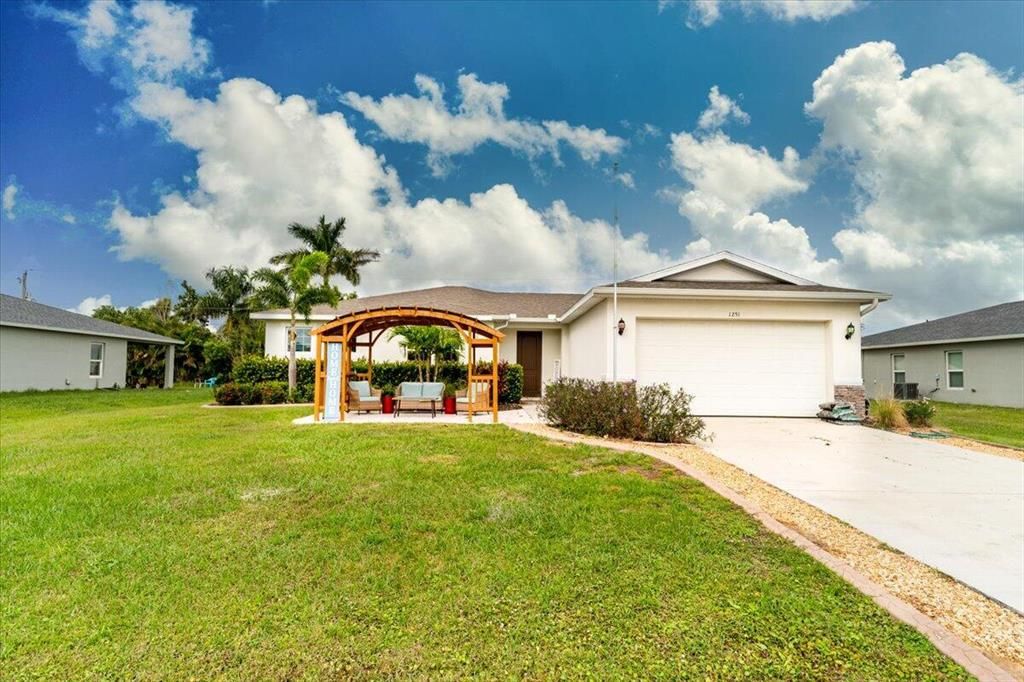 Photo of 1251 SW Goodman Avenue, Port St Lucie, FL 34953 (MLS # R10861185)