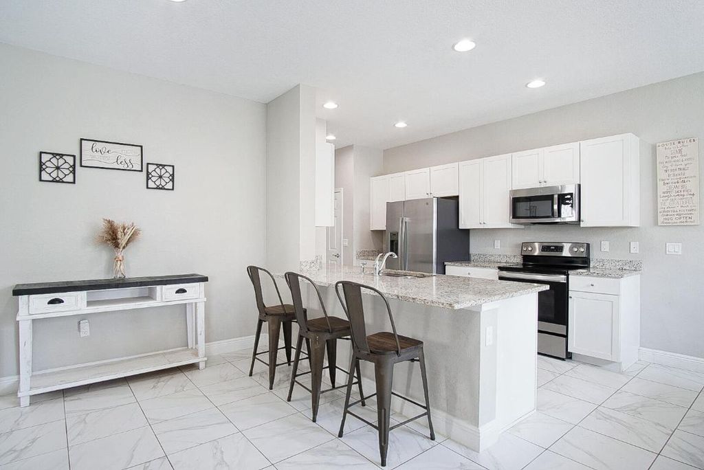 Photo of 1962 NW Cataluna Circle, Port Saint Lucie, FL 34986 (MLS # R11135827)