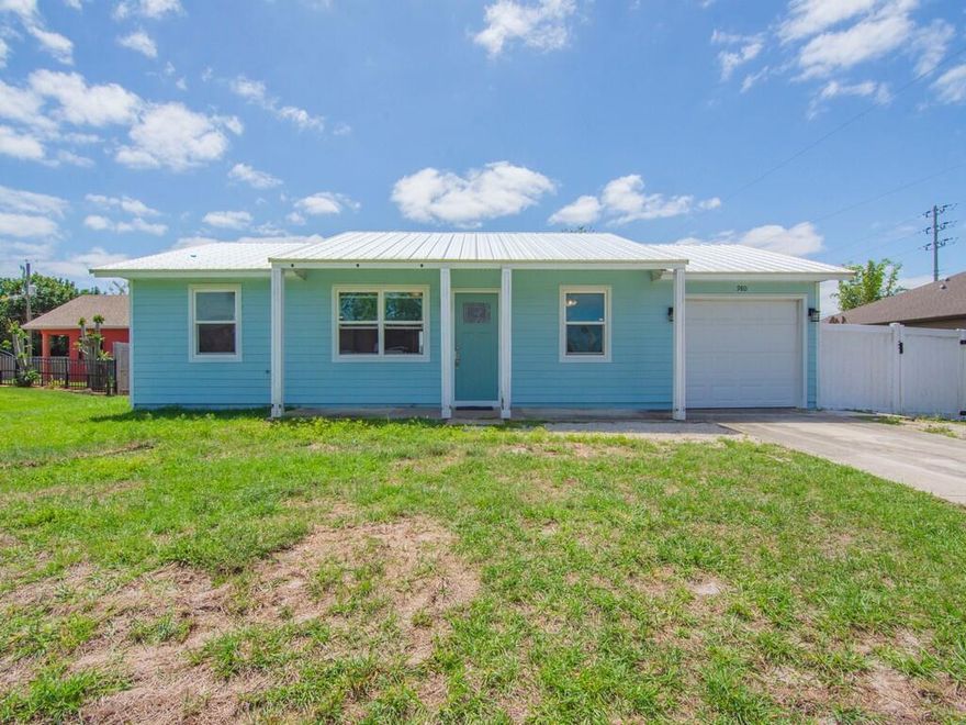 Renovated in 2021, this 2BR/2BA home with 1-car garage and split floor plan offers a great opportunity in a desirable neighborhood. Improvements include metal roof, cement board siding, A/C, impact windows, updated plumbing/electrical, sewer connection, shaker cabinets, quartz countertops, stainless appliances, and wood-look tile throughout. 2023 vinyl fence. Conveniently located near I-95 and the Turnpike, with no HOA and great schools. A wonderful home with solid upgrades and room for your finishing touches.