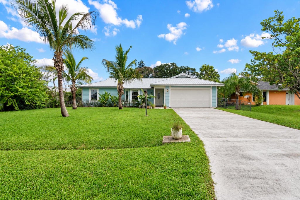 Photo of 2321 SE MASLAN Avenue, Port Saint Lucie, FL 34952 (MLS # B26077759)