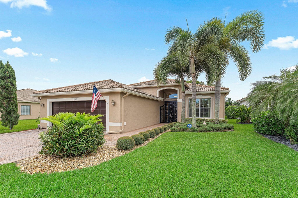 Photo of 11025 Carmelcove Circle, Boynton Beach, FL 33473 (MLS # B26074694)