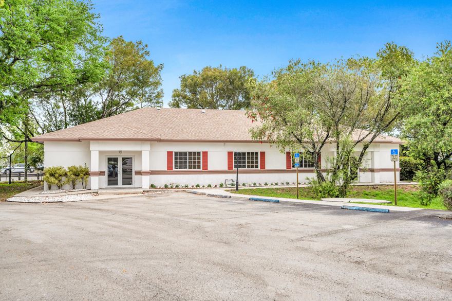 Less than 2 miles to Turnpike, free-standing zoned B-3 building. Functional, well-maintained office space, 3,473 SQFT in The Village Office & Classic Car Park. New roof installed in 2024, new HVAC in 2022. Impact windows and doors, wood flooring throughout. The property includes 15 parking spots (13 standard and 2 ADA). With two separate entrances, the layout is flexible and currently set up as one large (owner occupied) and one small suite (vacant).  Owner is willing to sign annual lease, offering immediate options for an owner-user or investor. Easy to access and ready for a new owner. Parking lot was just resurfaced and painted.