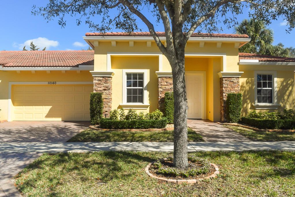 Photo of 10160 SW Canossa Way, Port Saint Lucie, FL 34986 (MLS # B26034917)