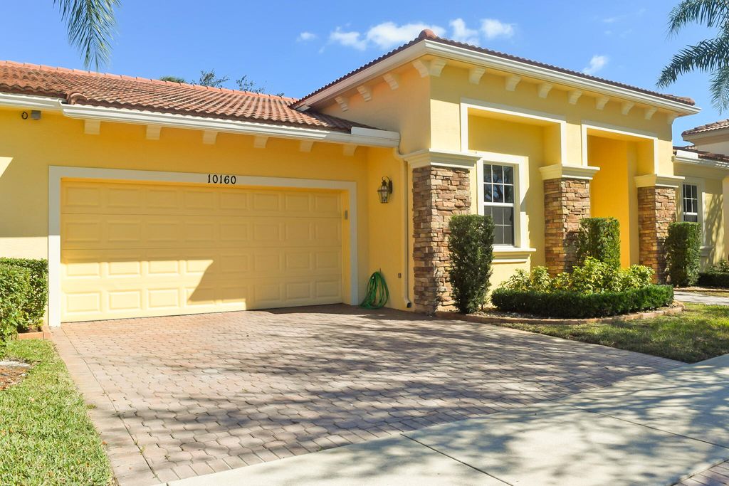 Photo of 10160 SW Canossa Way, Port Saint Lucie, FL 34986 (MLS # B26034917)
