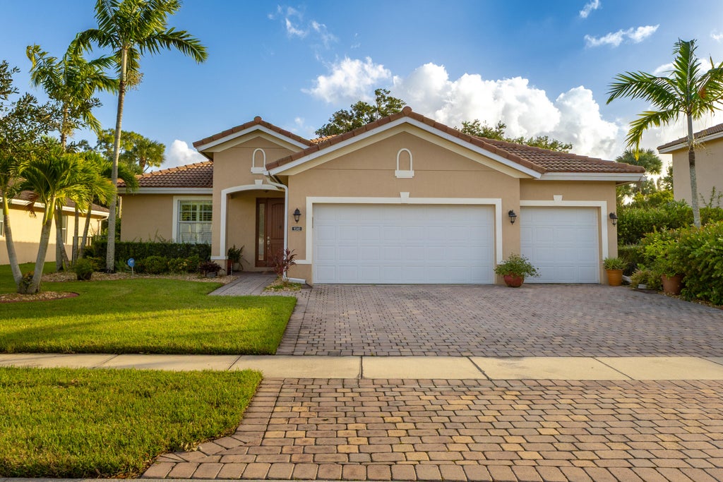 Photo of 9340 Silent Oak Circle, West Palm Beach, FL 33411 (MLS # B26093925)