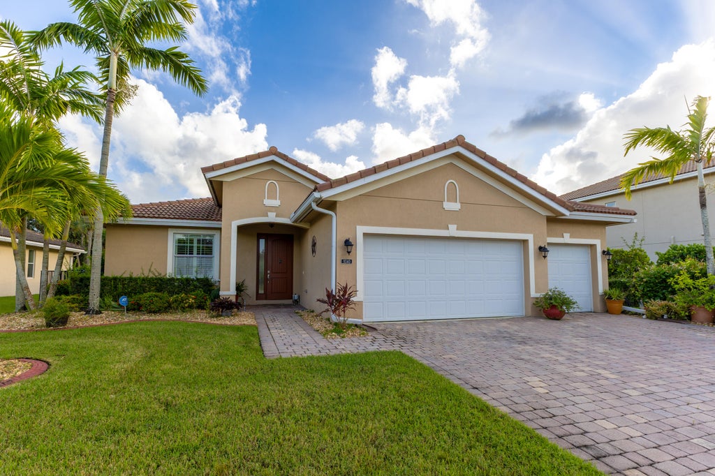 Photo of 9340 Silent Oak Circle, West Palm Beach, FL 33411 (MLS # B26093925)