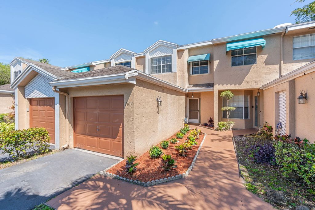 Photo of 7107 Woodmont Way, Tamarac, FL 33321 (MLS # B26008270)