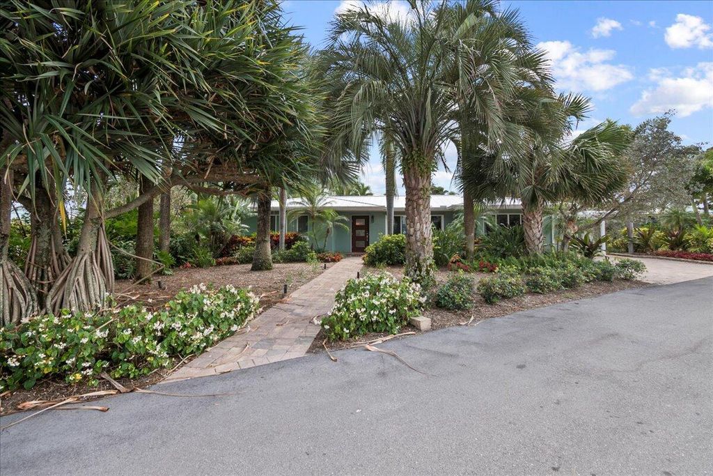 Photo of 440 Jupiter Lane, Juno Beach, FL 33408 (MLS # R11163614)