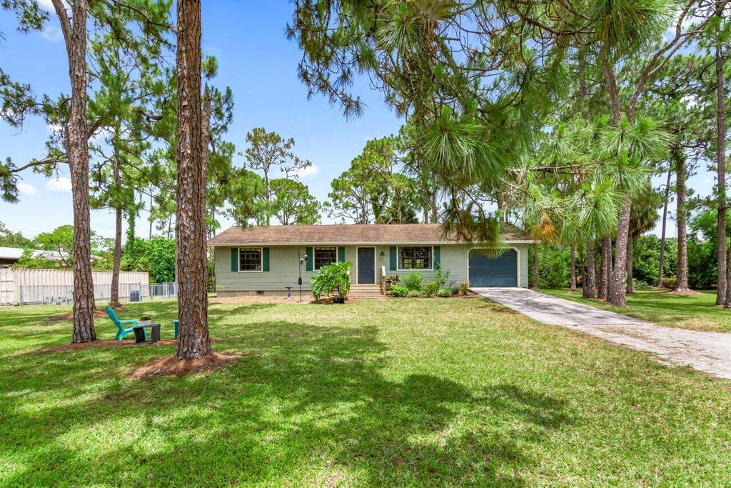 Photo of 13091 49 Street N, West Palm Beach, FL 33411 (MLS # R10983813)