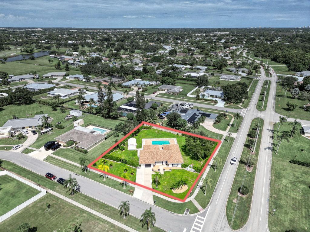 Photo of 1795 SE Adair Road, Port Saint Lucie, FL 34952 (MLS # R11127644)