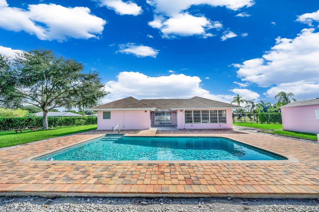 Photo of 1795 SE Adair Road, Port Saint Lucie, FL 34952 (MLS # R11127644)