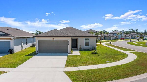 Seller is offering $10,000 in Buyer's Concessions! This charming 3-bedroom, 2-bath home built in 2021 combines modern comfort with smart design, making it an ideal choice for today's homebuyer. Situated on a corner lot with a fully fenced yard, it offers both privacy and curb appeal. Inside, the open-concept layout maximizes space, creating a home that feels spacious yet cozy. The primary suite includes a private bath for added comfort, while two additional bedrooms provide flexibility for guests or a home office. Located in a desirable community with very low HOA fees, residents enjoy access to a clubhouse, swimming pool, fitness center, tennis courts, volleyball, and scenic trails.Conveniently positioned near I-95, the Florida Turnpike, downtown Fort Pierce.