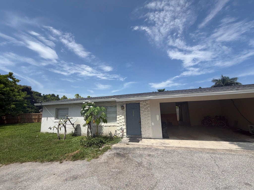 Photo of 4161 Sherri Court, Lake Worth, FL 33461 (MLS # B26064428)