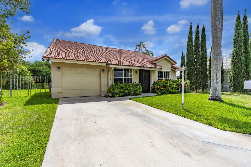 Photo of 11140 LAKEAIRE Circle, Boca Raton, FL 33498 (MLS # B26069015)