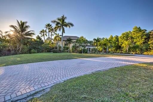 Photo of 6452 Royal Palm Beach Blvd, West Palm Beach, FL 33412 (MLS # B26054940)