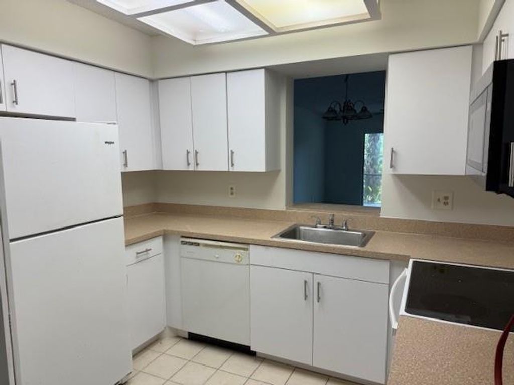 Photo of 2212 S Cypress Bend Drive #104, Pompano Beach, FL 33069 (MLS # F10487492)