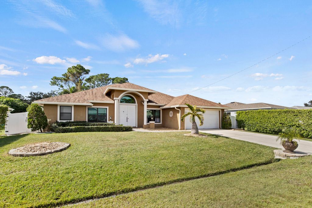 Photo of 1698 SW Day Street, Port Saint Lucie, FL 34953 (MLS # R10936343)