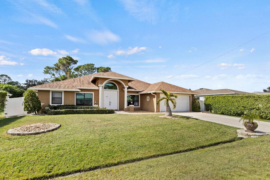 Photo of 1698 SW Day Street, Port Saint Lucie, FL 34953 (MLS # R10936343)