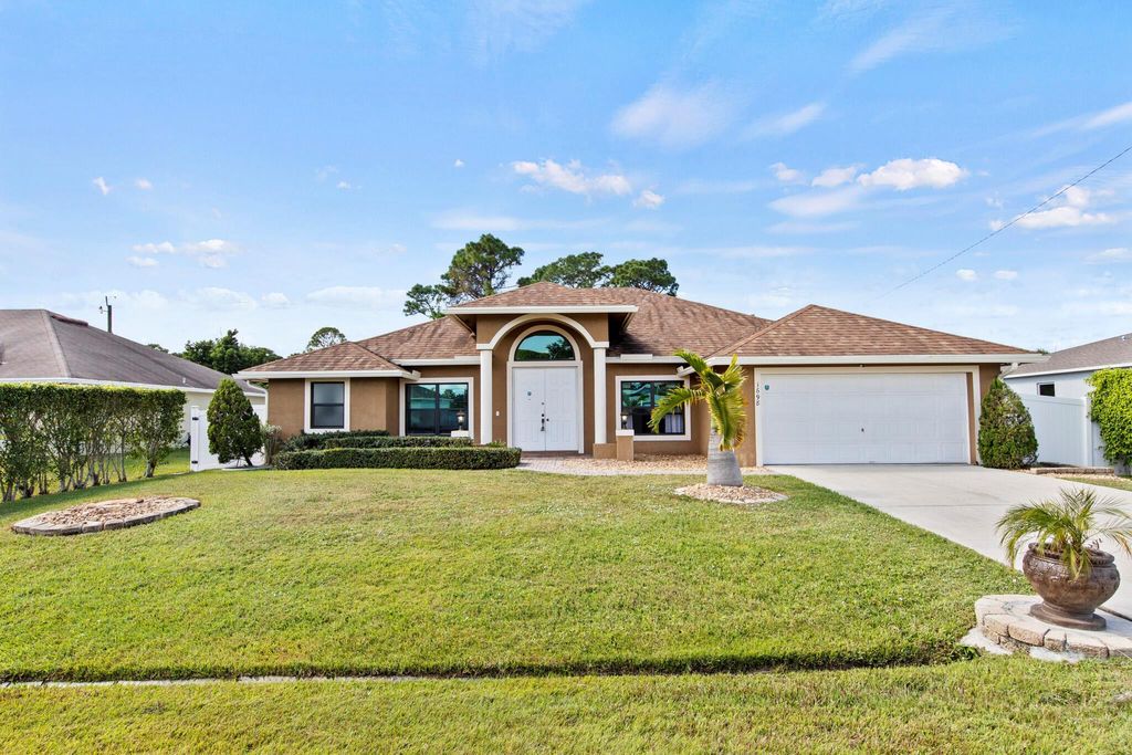 Photo of 1698 SW Day Street, Port Saint Lucie, FL 34953 (MLS # R10936343)