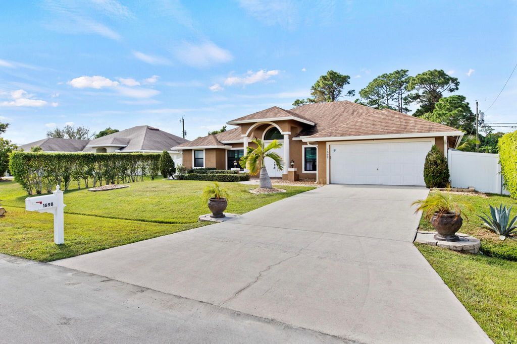 Photo of 1698 SW Day Street, Port Saint Lucie, FL 34953 (MLS # R10936343)