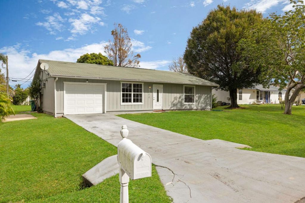 Photo of 733 SE Academy Lane, Port Saint Lucie, FL 34984 (MLS # R10951309)