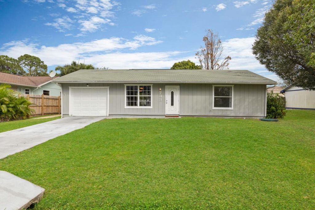 Photo of 733 SE Academy Lane, Port Saint Lucie, FL 34984 (MLS # R10951309)