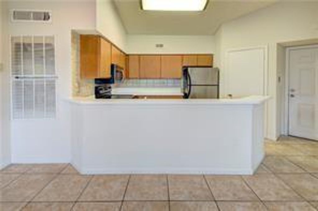 Photo of 2445 SW 18th Terrace #110, Fort Lauderdale, FL 33315 (MLS # B26039009)