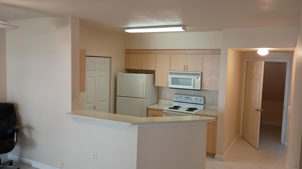 Photo of 709 Belmont Lane #709, North Lauderdale, FL 33068 (MLS # B26068703)