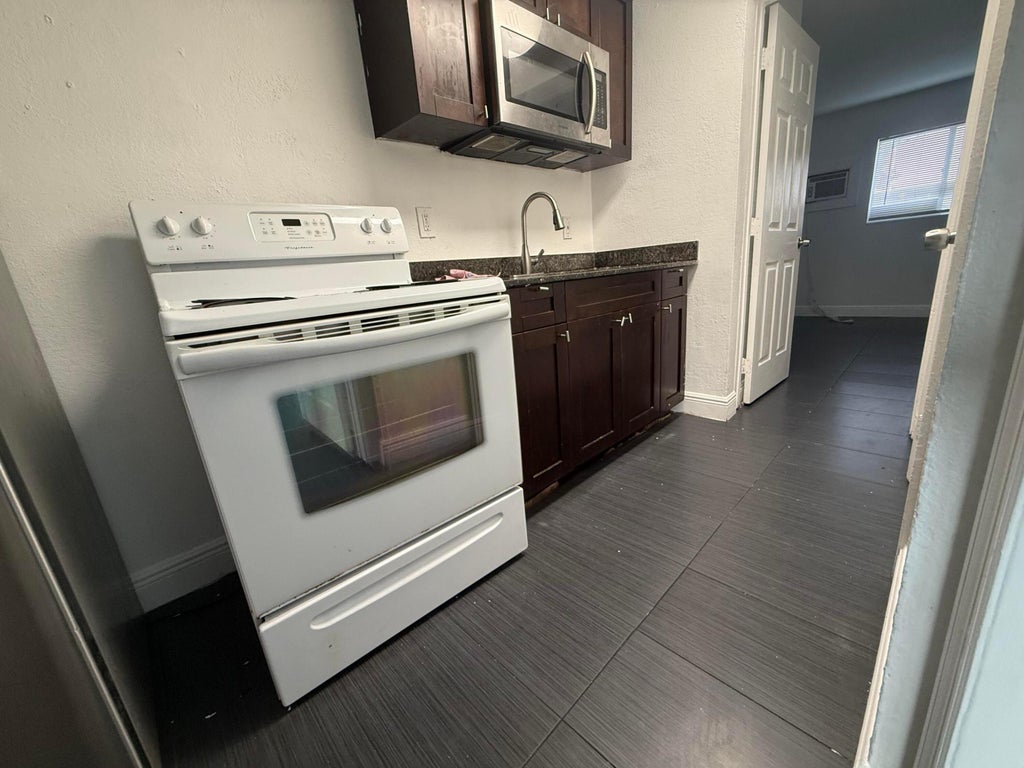 Photo of 37 SW 14th Street #9, Dania Beach, FL 33004 (MLS # B26062888)