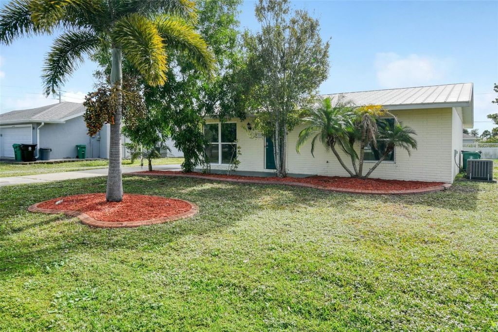 Photo of 118 SW Ray Avenue, Port Saint Lucie, FL 34983 (MLS # F10511630)