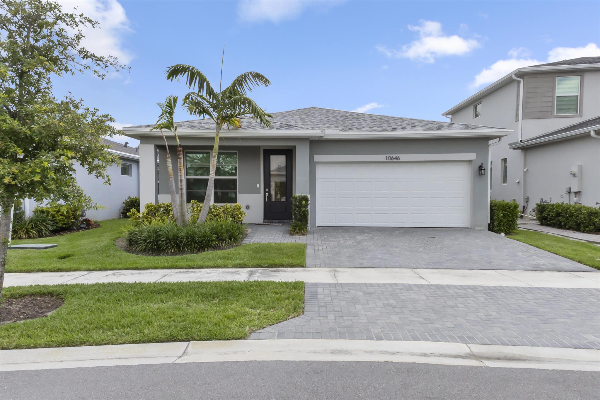 Welcome home to this beautiful Briar floorplan in Tradition. This 1997 sq ft single-family home boasts 3 bedrooms and 2.5 baths. There is also a flex room that can be used as an office or play room. This gated community is almost fully built out and will have a community pool within a short walking distance. The home has been nicely updated throughout with wood-look tile everywhere besides the 2 spare bedrooms and white cabinets in the kitchen and bathrooms. Private backyard setting with a covered lanai.
