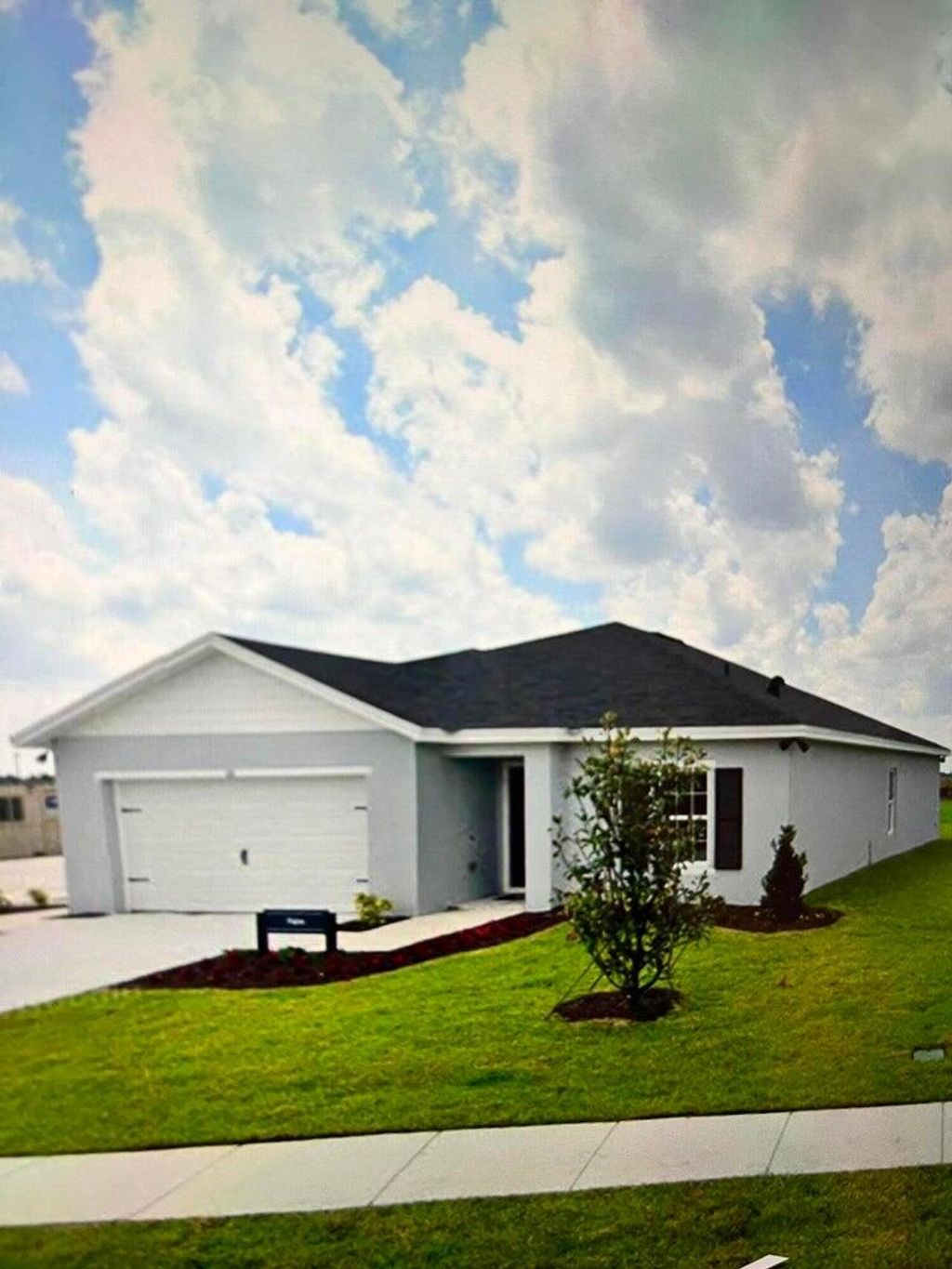 Photo of 110 Dabou Loop, Belle Glade, FL 33430 (MLS # R11073104)