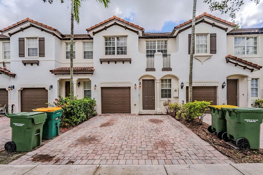 Spacious two-story townhouse featuring 4 bedrooms and 3 bathrooms with a 1-car garage. The kitchen includes a convenient bar and pantry, perfect for meal prep and entertaining. One or more photos have been virtually staged to showcase the home's potential. Schedule a showing today!