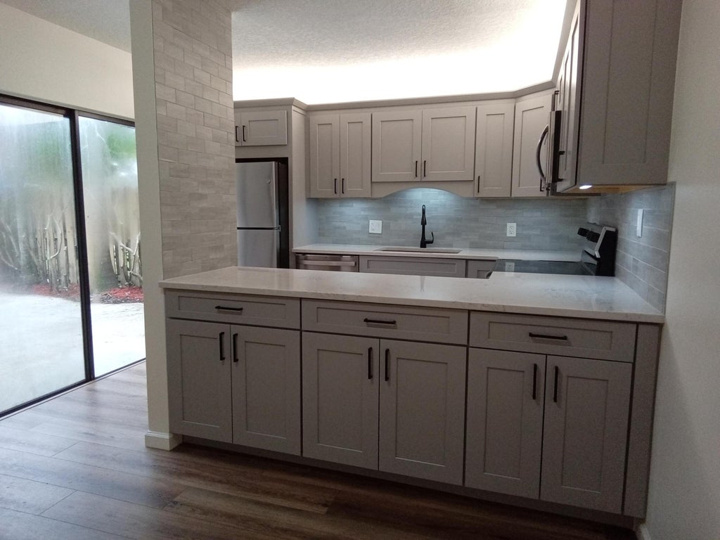 Photo of 105 1st Court, Palm Beach Gardens, FL 33410 (MLS # R11021609)