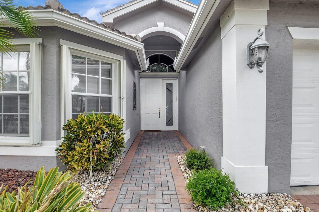 Photo of 9836 Tallyrand Drive, Lake Worth, FL 33467 (MLS # R11085311)