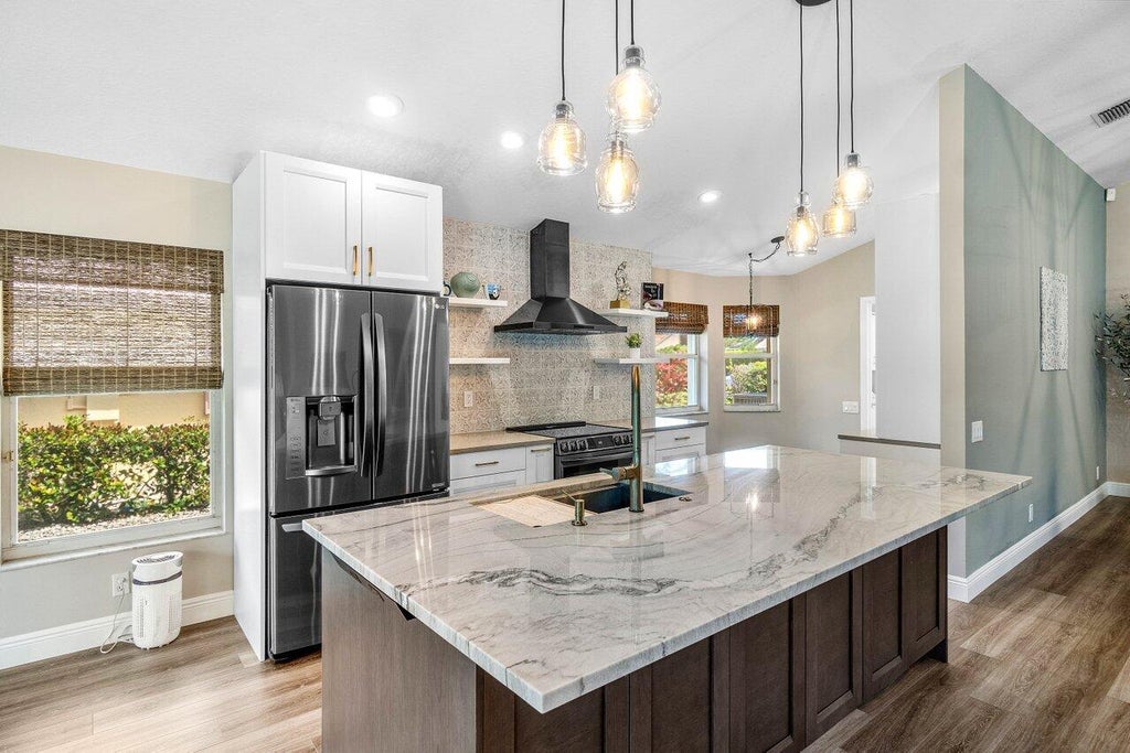 Photo of 6141 Hook Lane, Boynton Beach, FL 33437 (MLS # B26040560)