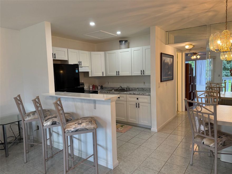 This beautifully maintained 1-bedroom, 1-bath second-floor unit is offered fully furnished, featuring tasteful décor, flat-screen TVs, and a newly renovated kitchen with modern finishes. Enjoy comfort, convenience, and access to all of Century Village's resort-style amenities, including 24-hour security, a fitness center, 16 heated pools, tennis and pickleball courts, shuffleboard, billiards, a theater for live shows and movies, library, and art classes. Residents enjoy courtesy transportation to malls, restaurants, shopping, and medical offices. Located just minutes from the beach, this home combines the best of South Florida 55+ living—vibrant, active, and maintenance-free. Welcome home to Century Village Deerfield Beach! 650+ credit required. Association can take 30 days to approve