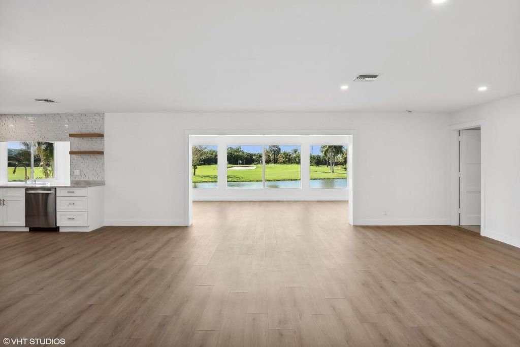 Photo of 422 French Royale Circle, Atlantis, FL 33462 (MLS # R10973466)