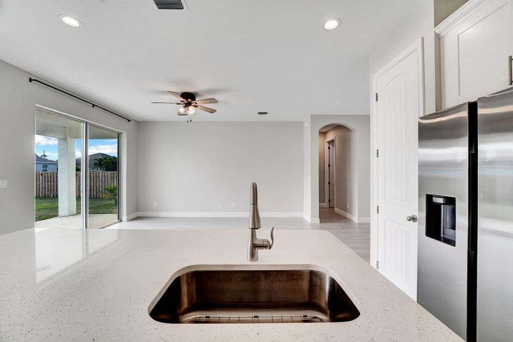 Photo of 556 SW Laconic Avenue, Port Saint Lucie, FL 34953 (MLS # R10943434)
