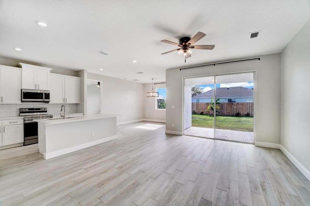 Photo of 556 SW Laconic Avenue, Port Saint Lucie, FL 34953 (MLS # R10943434)