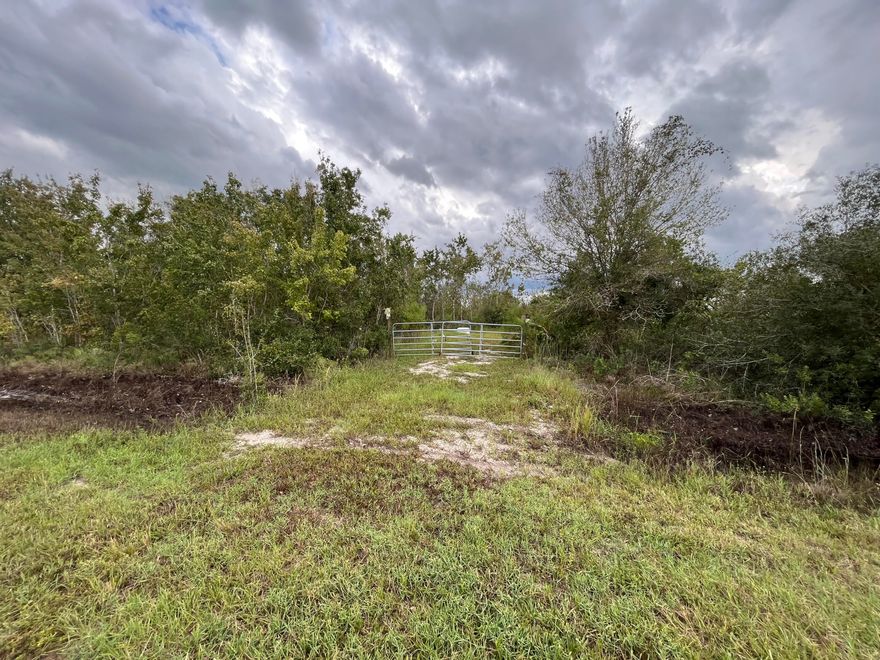 Build or bring your dream home and barn on this beautiful and private high and dry semi cleared with nice oak trees 1.25-acres lot just off the main paved road with a pond, entry gate and culvert pipe already in place to access the property.  Property is Ready and in a perfect location. there is so much to enjoy in Okeechobee County. Come to The Kissimmee River Preserve State Park West of this area as well is the Kissimmee River. The Kissimmee River flows into Lake Okeechobee and is well known for some of the best fishing. whether you like Fishing, hunting, mudding agriculture or just privacy here you have it all...
