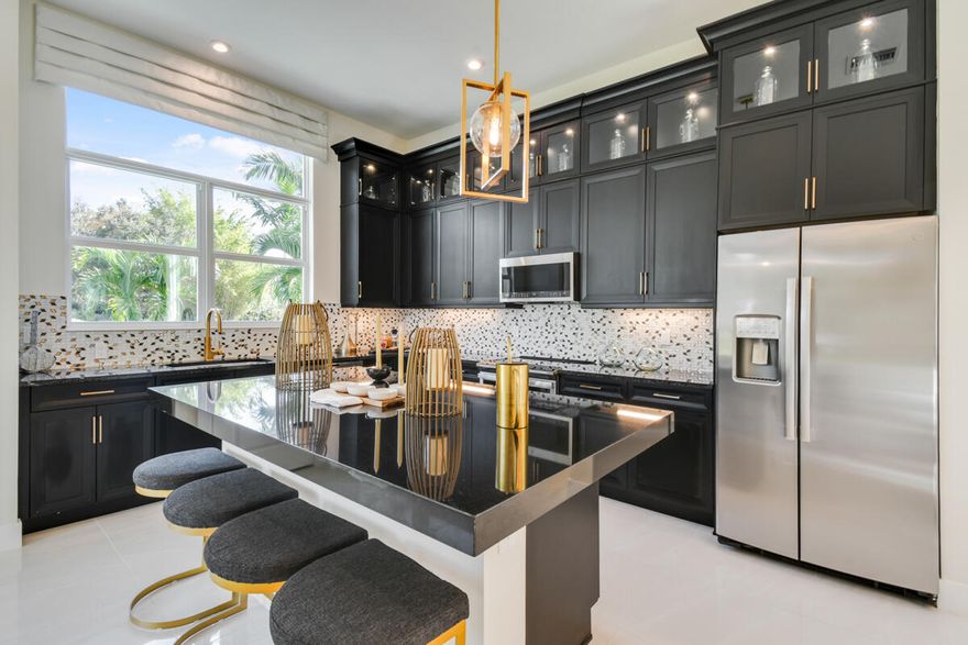 FURNISHED Model Home For Sale! Ever wanted to own a designer-furnished model home? This Beverly floor plan is fully furnished and move-in ready, offering 2 bedrooms, 2 full bathrooms, and a versatile flex space.
The kitchen features second-tier cabinetry, upgraded appliances, and 3'' quartz countertops, designed for both style and functionality. The home is being sold as-is, including all designer furnishings, light fixtures, built-ins, and window treatments.
The backyard is already complete with a full deck and overlooks a peaceful setting with no homes in front or behind, providing a quiet and private homesite. Rivella offers a prime location close to the upcoming Port District, Saints Golf Course, area beaches, and I-95.