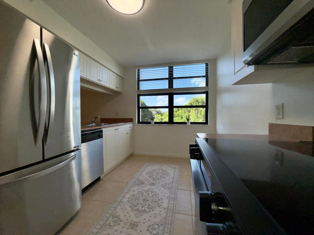 Photo of 2025 Lavers Circle #D411, Delray Beach, FL 33444 (MLS # R11138323)