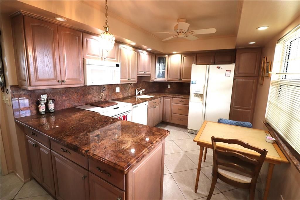 Photo of 3520 Oaks Way Way #704, Pompano Beach, FL 33069 (MLS # F10345315)